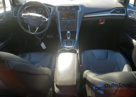 2014 Ford Fusion Titanium z USA, uszkodzony, nr VIN 3FA6P0K97ER211274